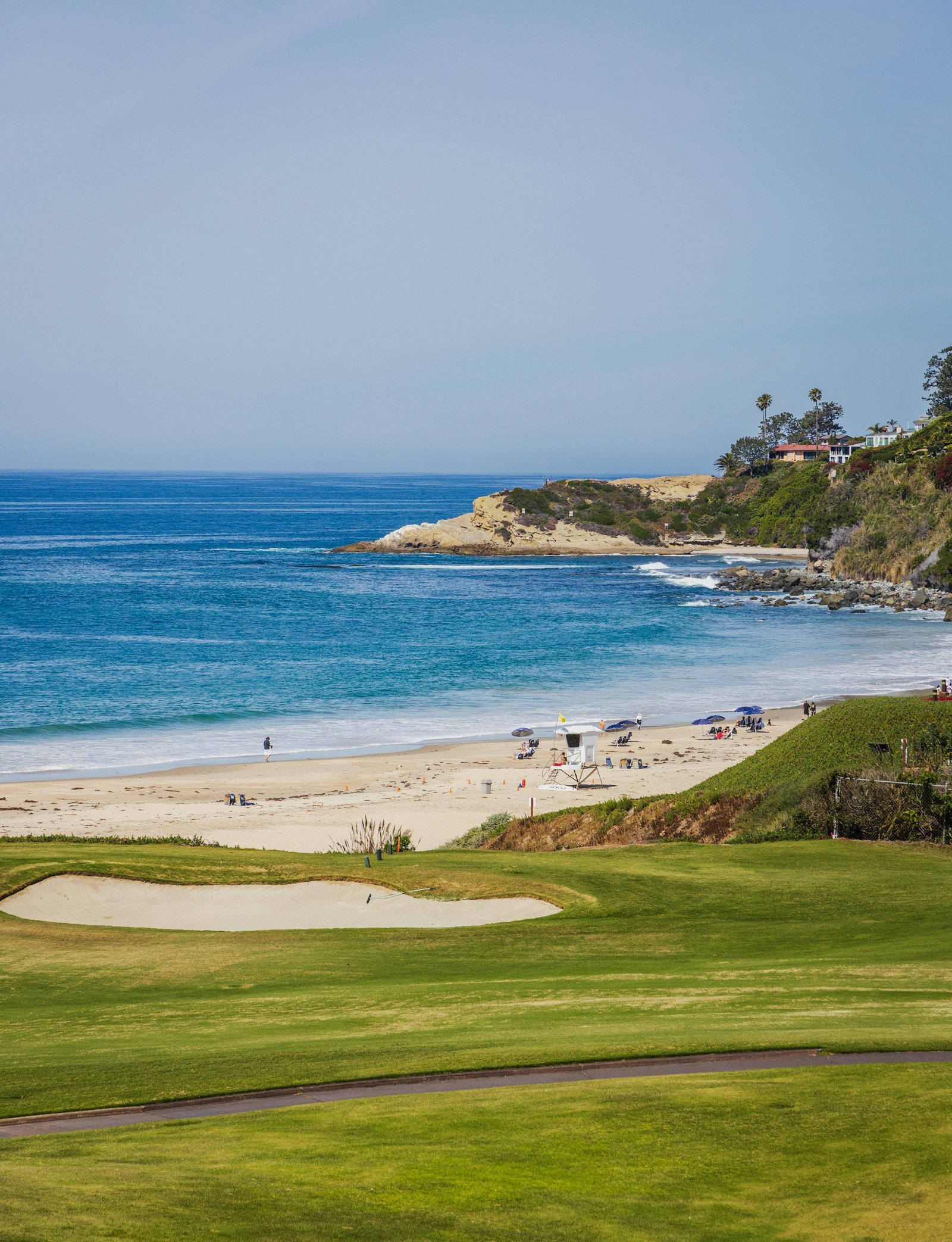 Sandy beach and blue ocean along the coast