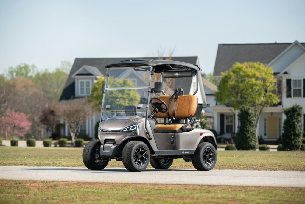 Best Golf Carts for Long Island Neighborhoods: A 2025 Buyer’s Guide Grey four-seat golf cart parked on a residential street