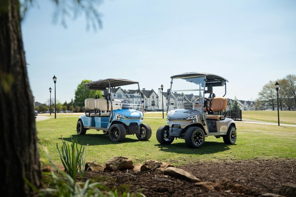 Golf Cart Safety Tips for Families Two golf carts parked on a sunny lawn